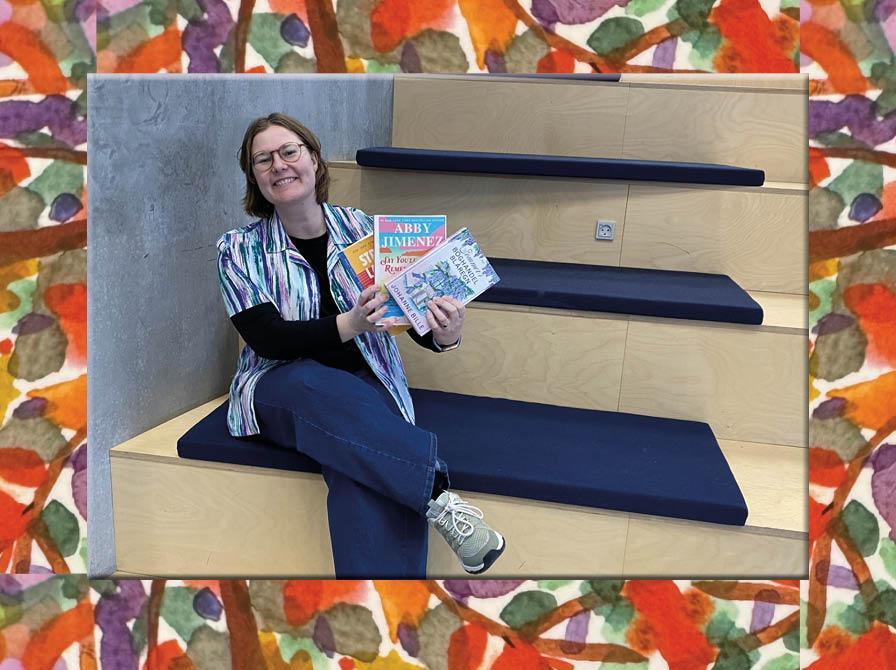 Line med en stak bøger